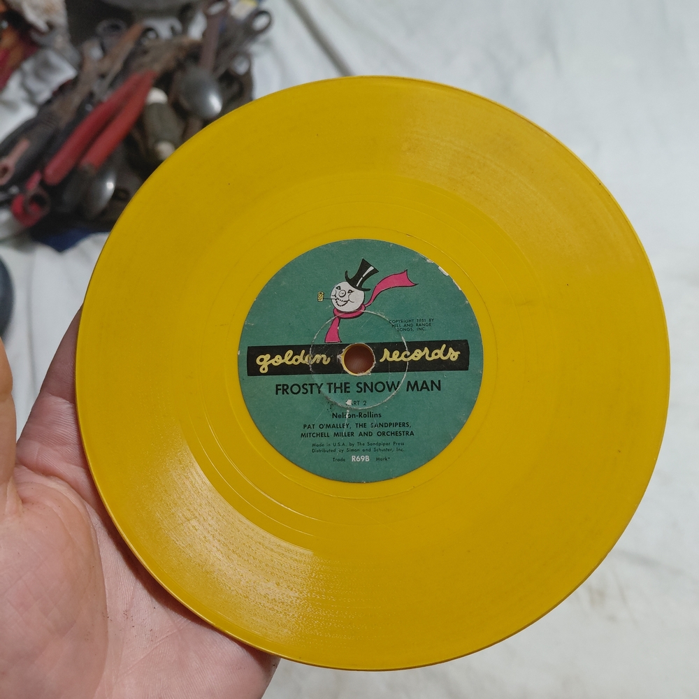 vinyl Golden Records 78 RPM or 45 RPM record featuring "Frosty the Snow Man".